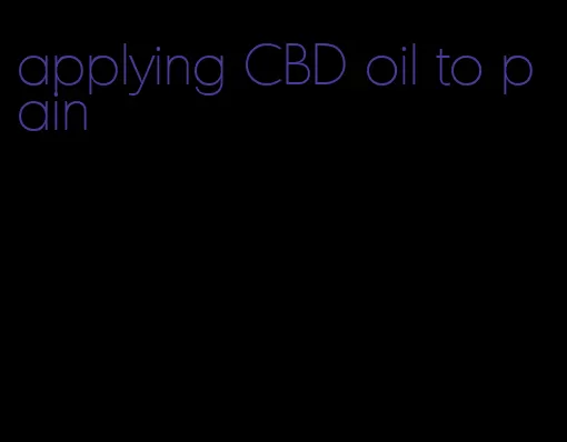 applying CBD oil to pain